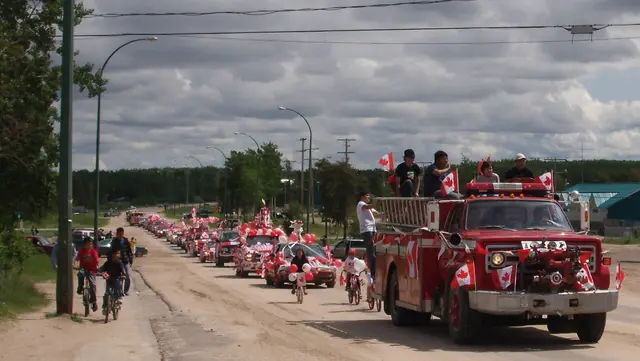 Canada Day parade led by a fire truck